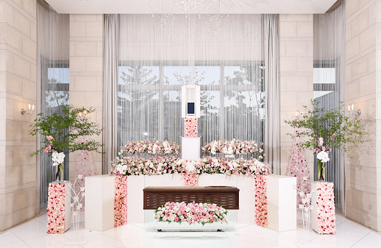 ピンク色の花を基調とした花祭壇